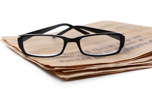 Brille und Zeitungen Hintergrund — Stockfoto