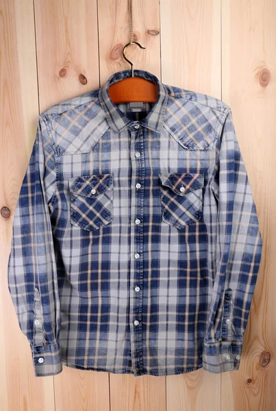 Male shirt on hanger — Stock Photo, Image