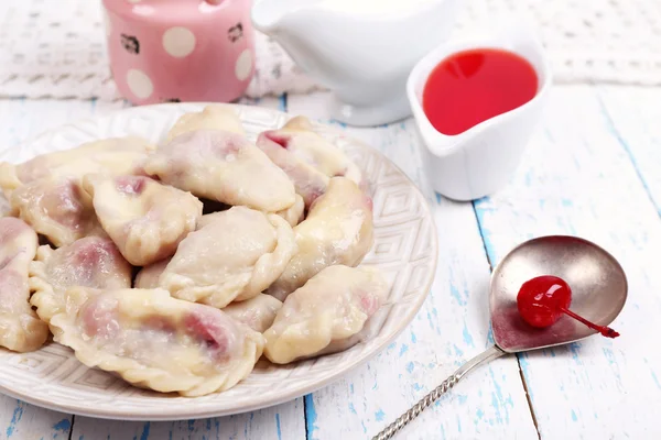 Vareniki with cherry on plate — Stock Photo, Image