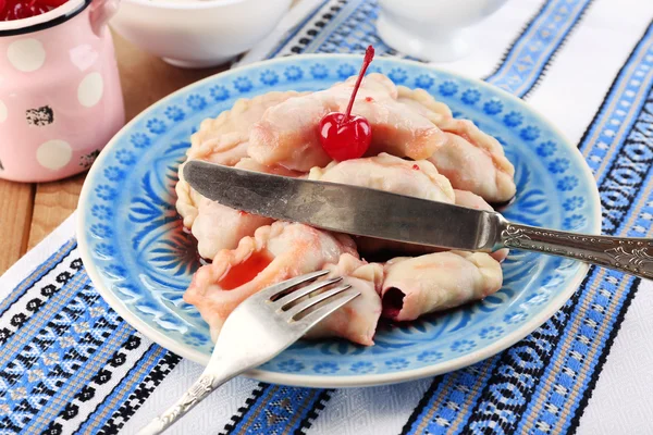 Vareniki with cherry on plate — Stock Photo, Image
