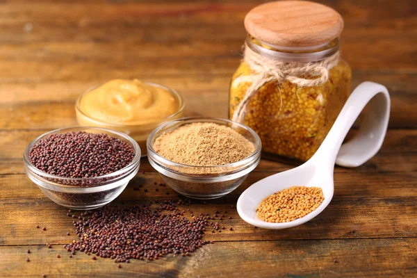 Mustard seeds, powder and sauce — Stock Photo, Image