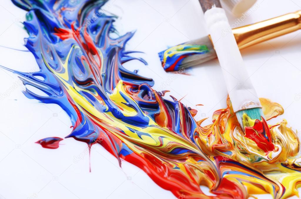 Mixing colorful paints