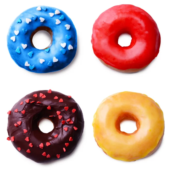 Köstliche Donuts Collage, isoliert auf weiß — Stockfoto