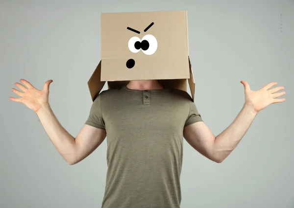 Man with cardboard box — Stock Photo, Image