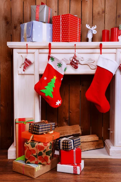 Fireplace with Christmas gifts — Stock Photo, Image