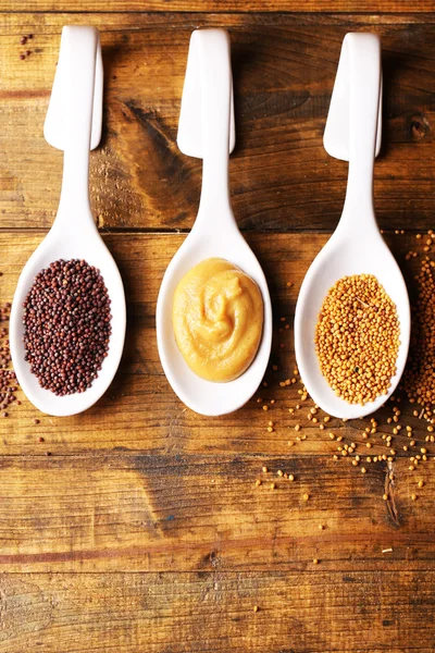 Mustard seeds, powder and sauce — Stock Photo, Image