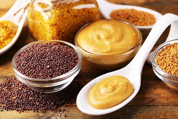 Mustard seeds, powder and sauce — Stock Photo, Image