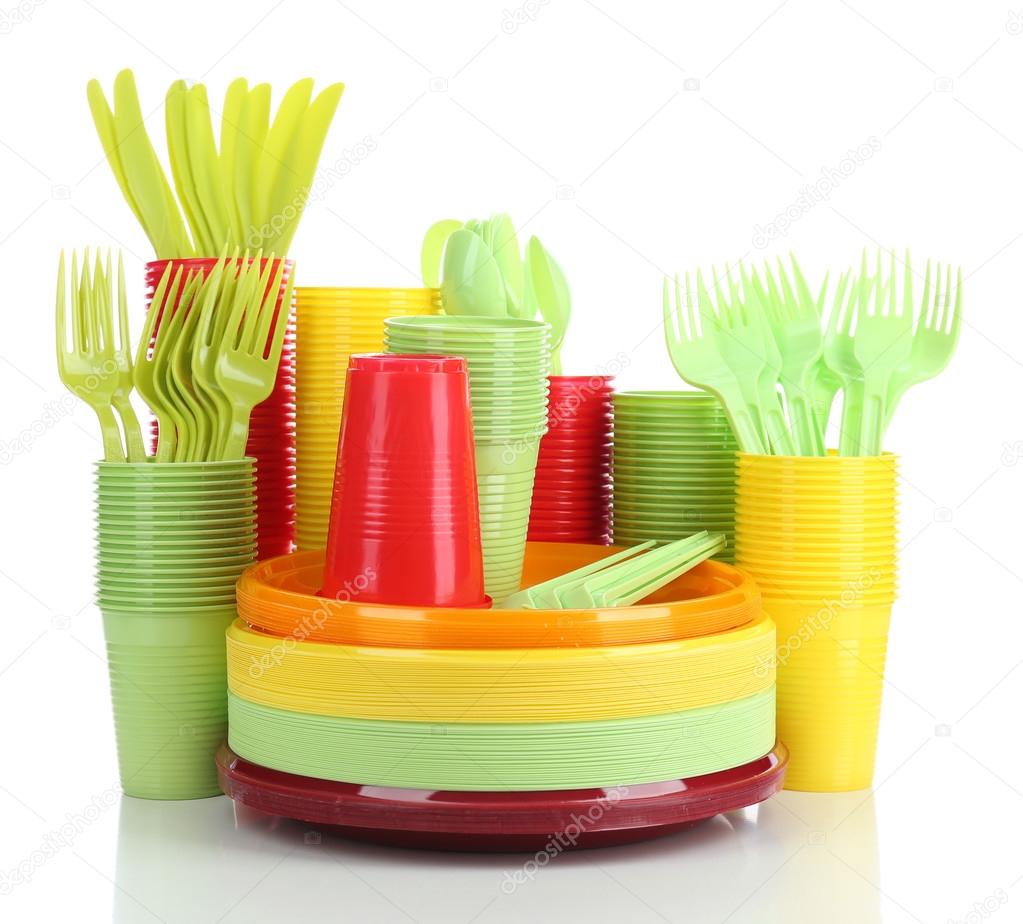 Bright plastic disposable tableware — Stock Photo © belchonock 61127673