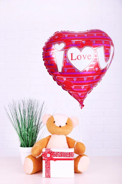 Teddy bear and heart balloon — Stock Photo, Image