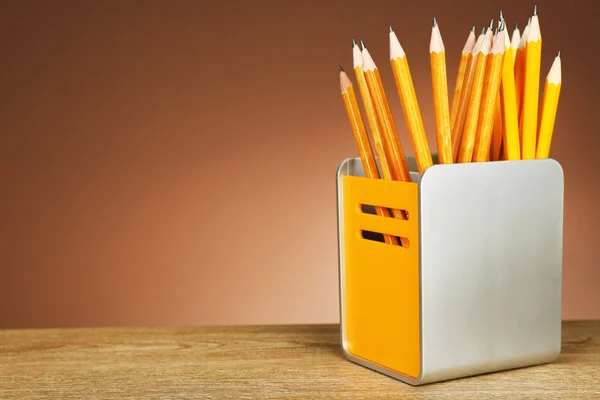 Many pencils in metal holder — Stock Photo, Image