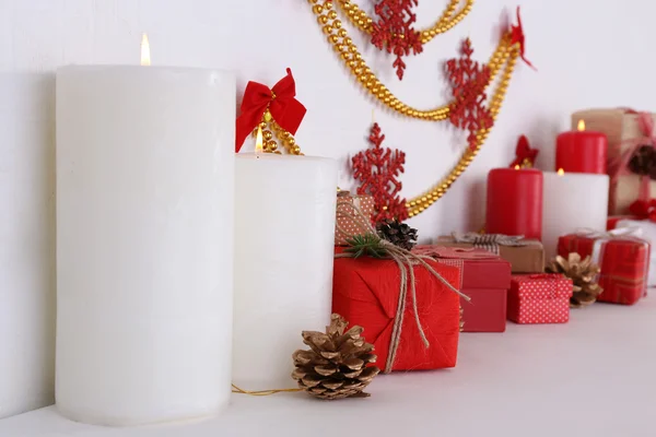 Christmas candles on shelf — Stock Photo, Image