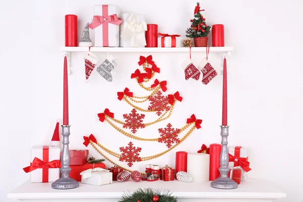 Christmas decorations on mantelpiece — Stock Photo, Image