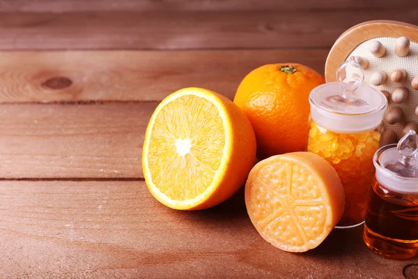 Orange and essential oil — Stock Photo, Image