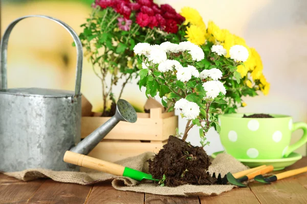 Rustic table with flowers — Stock Photo, Image