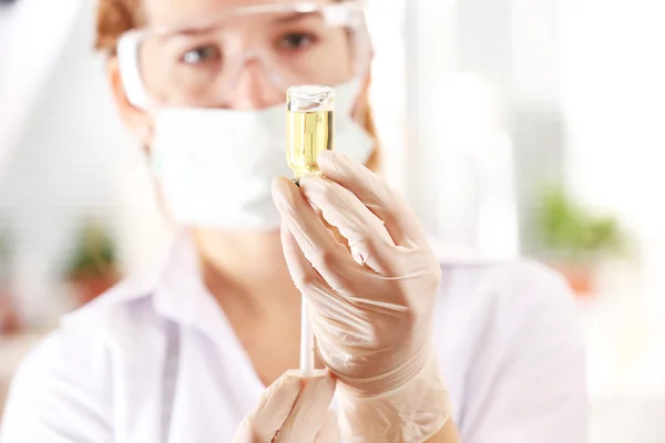 Doctor with medical syringe — Stock Photo, Image