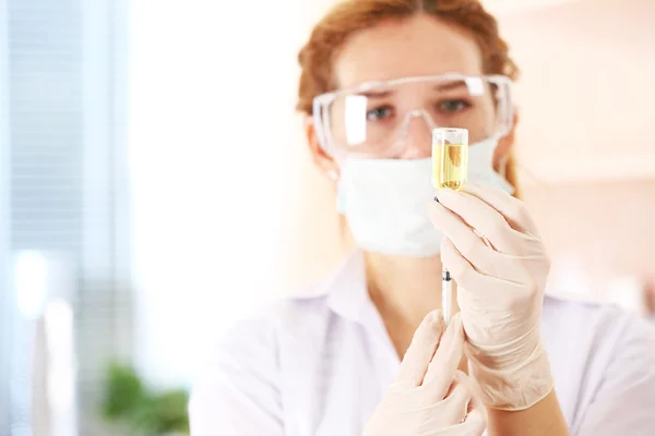 Doctor with medical syringe — Stock Photo, Image