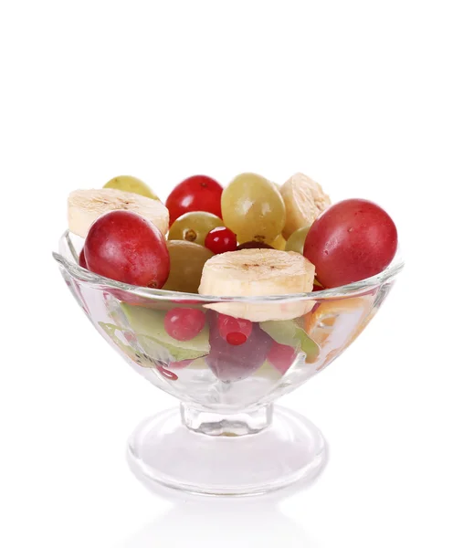 Mix of fruit in glass saucer isolated on white — Stock Photo, Image