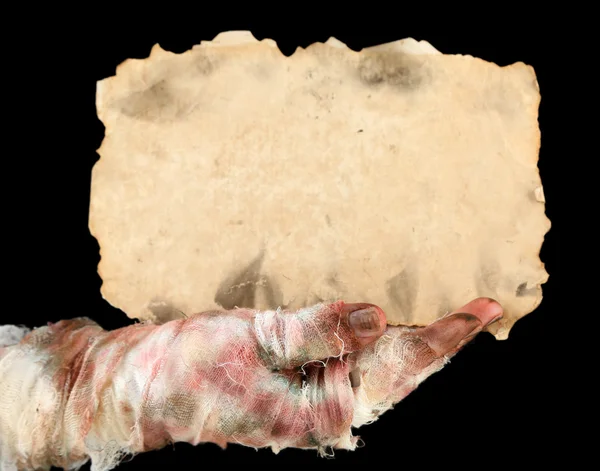 Hand of mummy with old paper — Stock Photo, Image