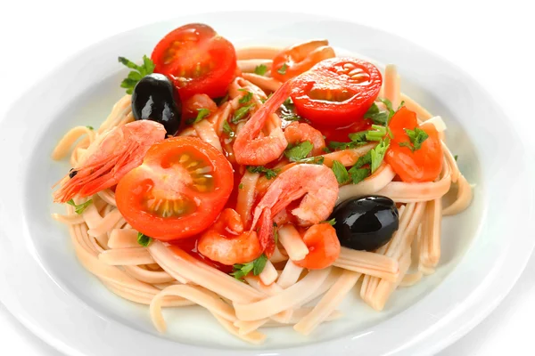 Tasty pasta with shrimps, black olives and tomatoes isolated on white — Stock Photo, Image