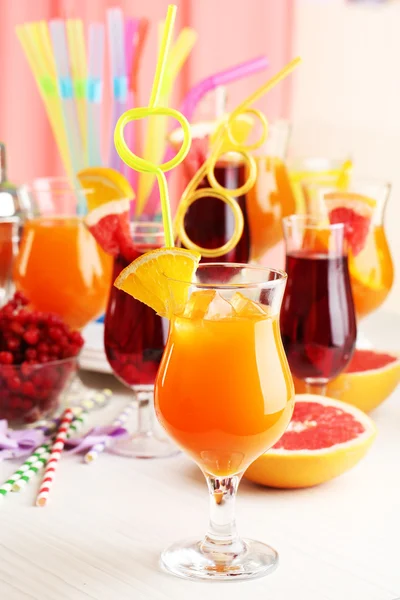 Glasses of fruit cocktails in party close-up — Stock Photo, Image