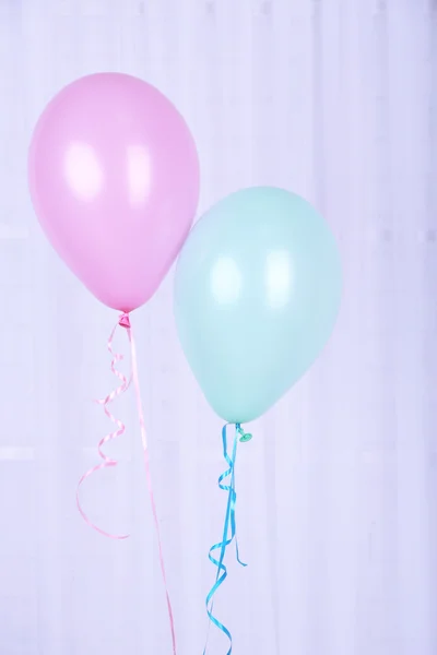 Blauwe en roze ballonnen — Stockfoto