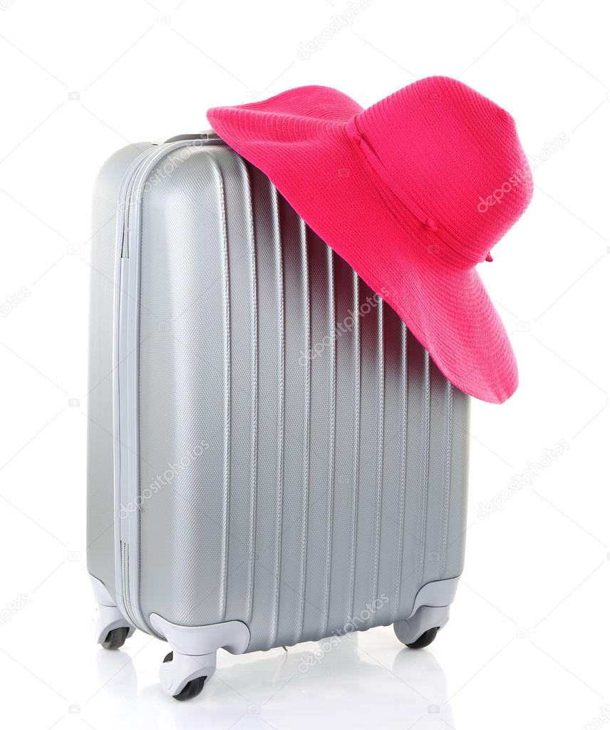 Travel suitcase and hat