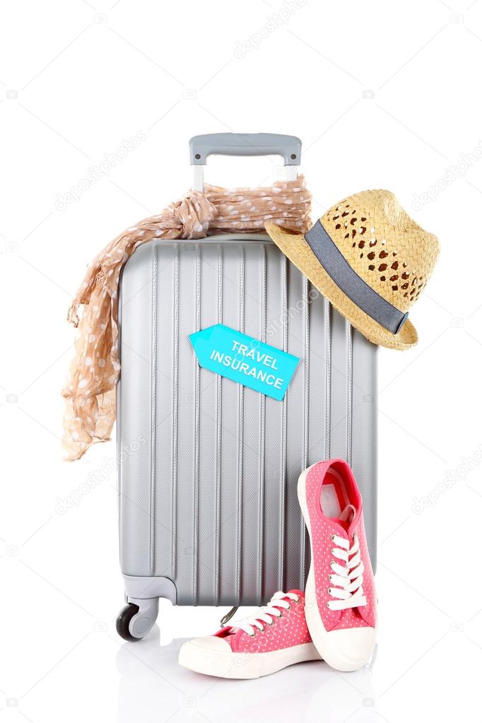 Travel suitcase and tourist stuff
