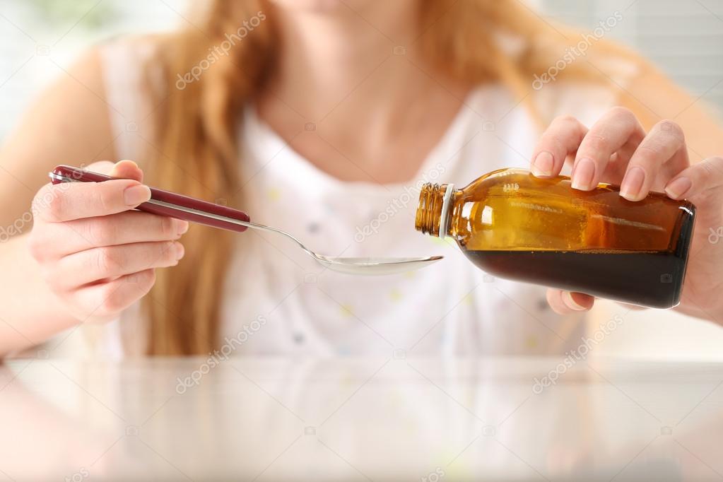 Female with Cough syrup