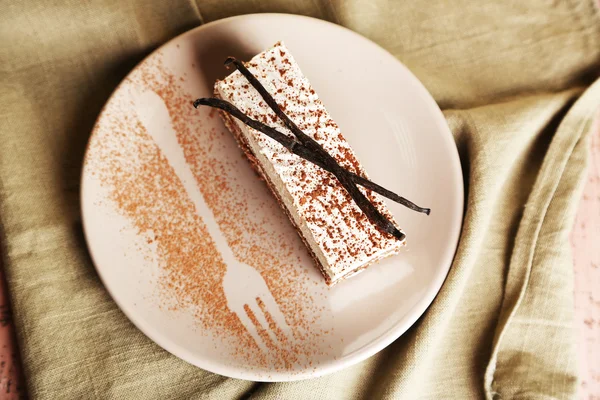 Tasty tiramisu cake on plate, close up — Stock Photo, Image