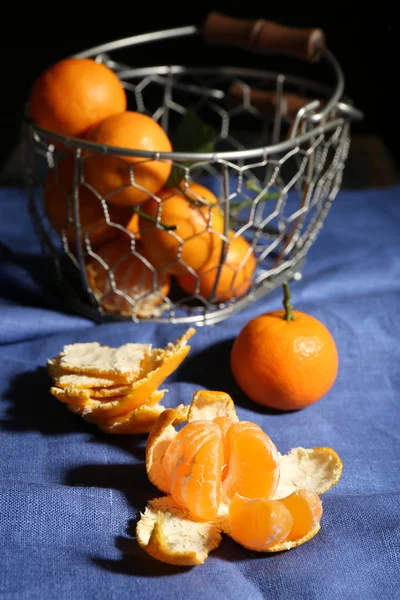 Juicy ripe tangerines on tablecloth — Stock Photo, Image