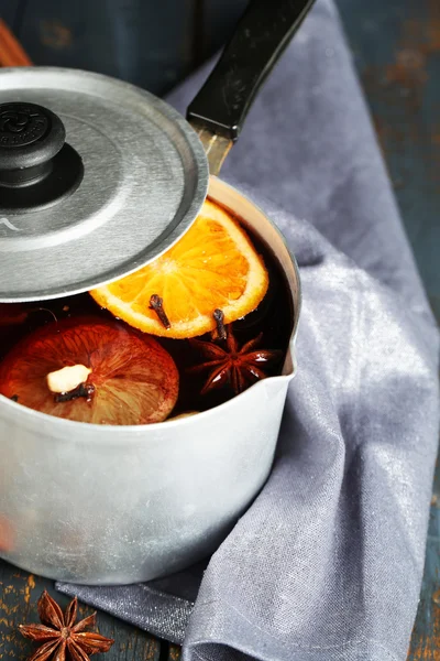 Old metal pan of tasty mulled wine — Stock Photo, Image