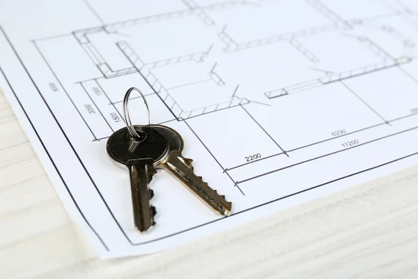 Key on house plan — Stock Photo, Image