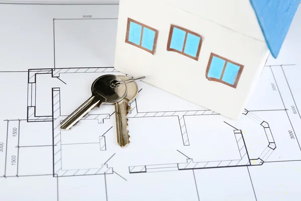 Key on house plan — Stock Photo, Image