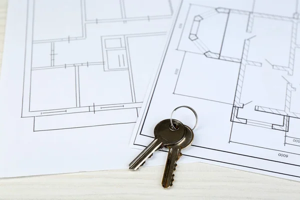 Key on house plan — Stock Photo, Image