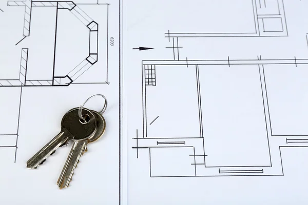 Key on house plan — Stock Photo, Image