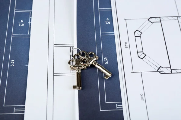 Key on house plan — Stock Photo, Image