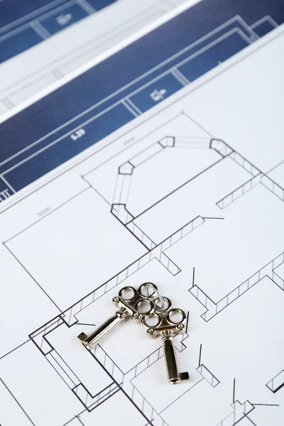 Key on house plan — Stock Photo, Image