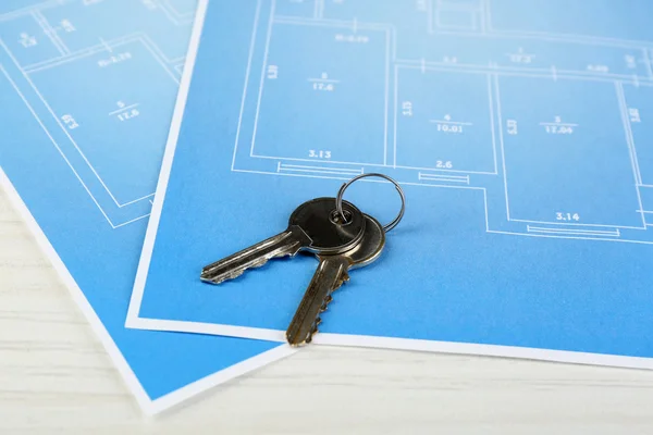 Key on house plan — Stock Photo, Image