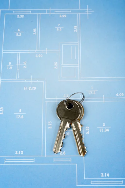 Key on house plan — Stock Photo, Image