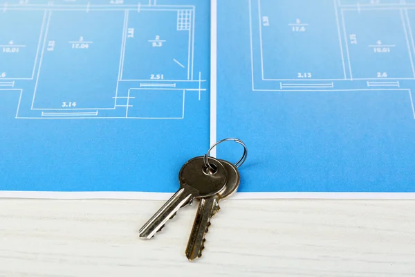 Key on house plan — Stock Photo, Image