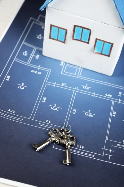 Key on house plan — Stock Photo, Image