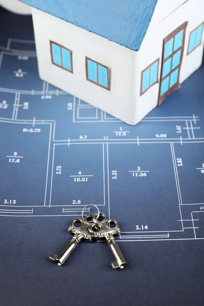 Key on house plan — Stock Photo, Image