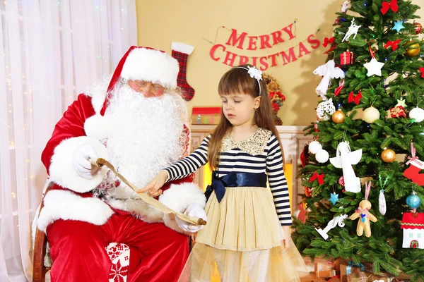 Santa Claus with little girl — Stock Photo, Image