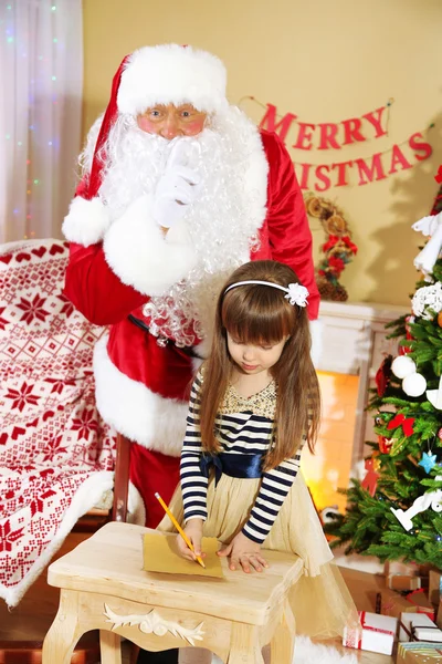 Papai Noel com a menina — Fotografia de Stock