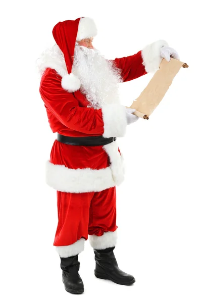 Santa Claus gospodarstwa lista życzeń na białym tle — Zdjęcie stockowe