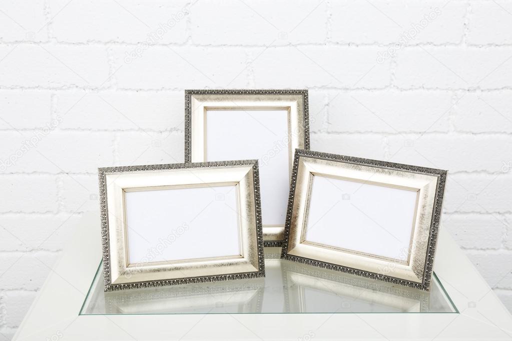 Photo frames on coffee table
