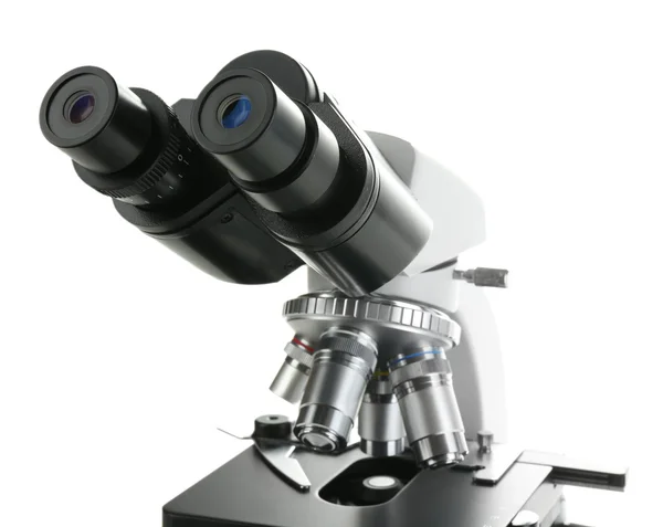 Mikroskop z bliska, na białym tle na biały — Zdjęcie stockowe
