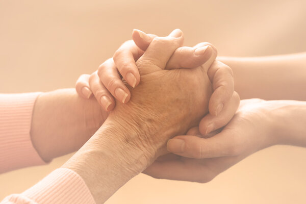 Helping hands, care for the elderly concept