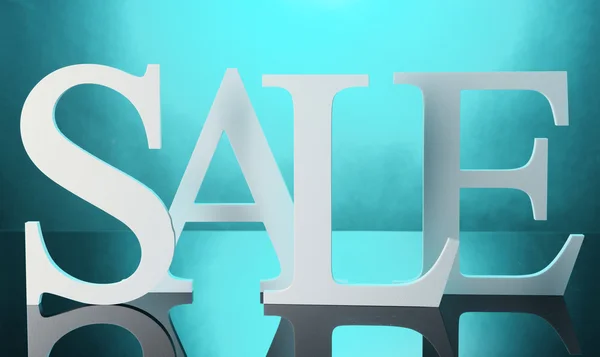 Sale on blue background — Stock Photo, Image