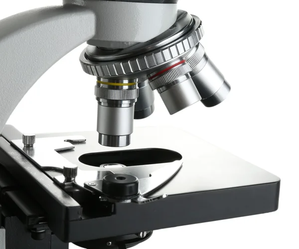 Микроскоп крупным планом, изолированный на белом — стоковое фото